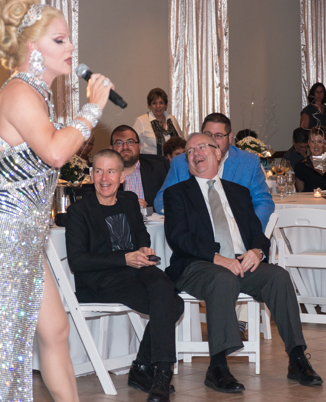 Murray Archibald and Steve Elkins have a laugh at a victim of Christopher Peterson's audience participation segment of the performance. BY DENY HOWETH